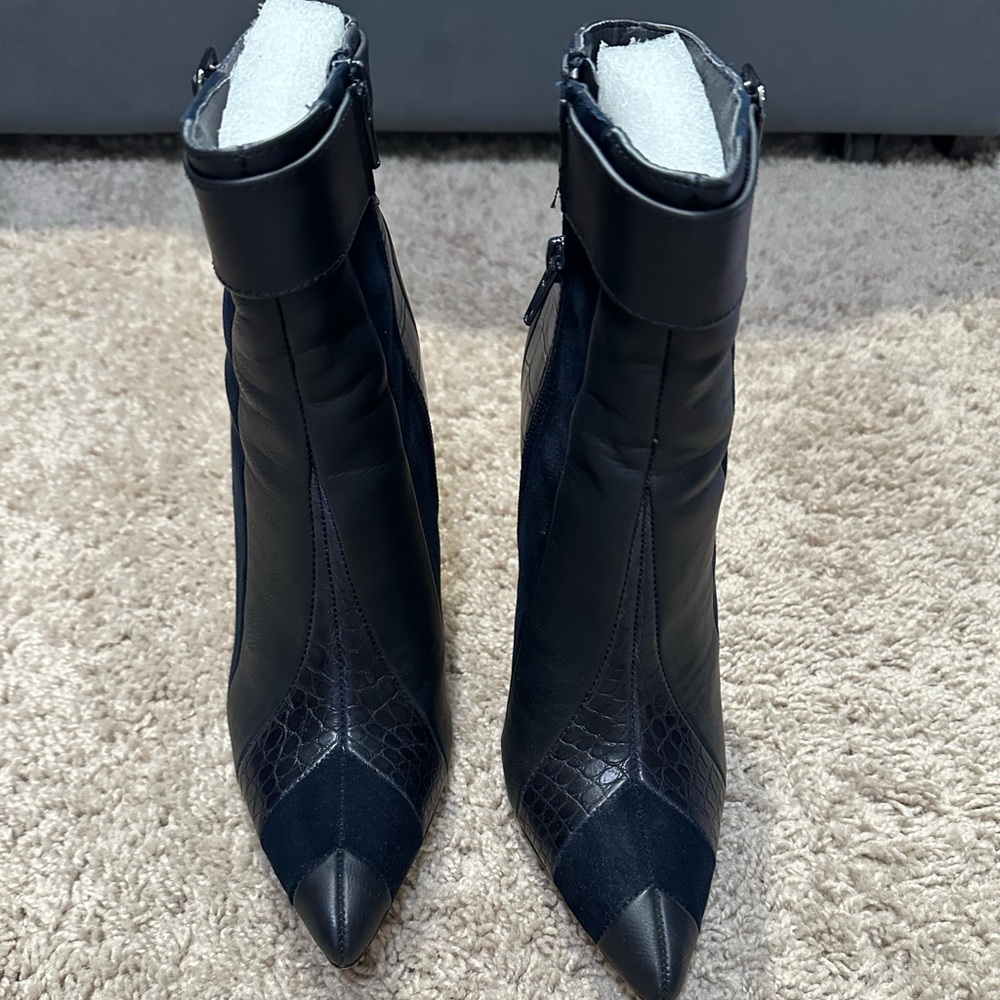 Navy blue ankle boots.